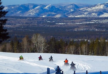 all inclusive custom snowmobile vacation packages in quebec, canada